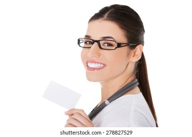 Portrait Of Female Doctor Holding White Card.