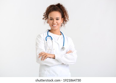 Portrait Of Female Doctor On Light Background