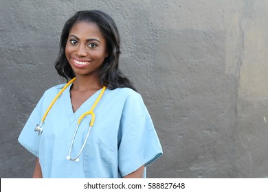 Portrait Of Female Doctor Standing Outside Hospital with Copy Space
