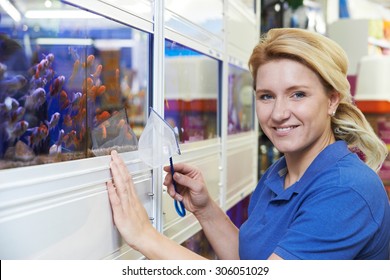 Portrait Of Female Employee In Pet Store