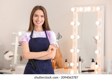 Portrait Of Female Hairdresser In Salon