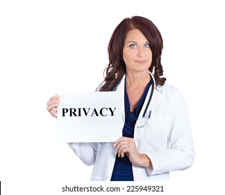 Portrait Female Healthcare Professional Doctor Scientist Researcher Pharmacist Holding Privacy Sign Isolated White Background. Confidentiality In Patient Care Medical Record Information HIPAA Concept