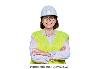 Portrait of female industrial worker in protective hard hat vest on white background - Powered by Shutterstock