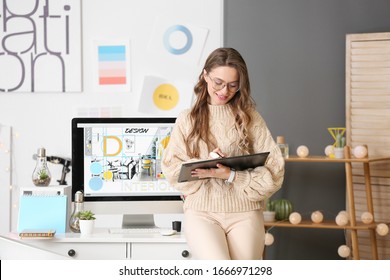 Portrait Of Female Interior Designer In Office