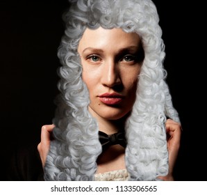 Portrait Of Female Lawyer On Black Background