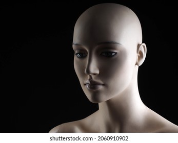 portrait of female mannequin on black background