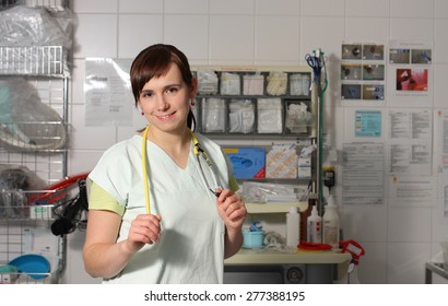 Portrait female nurse in ICU in the green uniform.