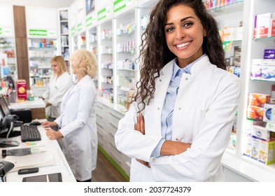 Portrait of female pharmacist in drugstore.