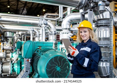 Portrait Of Female Power Plant Worker Holding Tablet Computer And Analyzing Production Results Of Natural Gas And Oil.