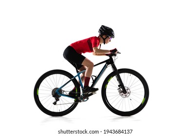 Portrait Of Female Professional Cycling Athlete, Young Woman On Road Bike Bicycle Practicing Isolated Over White Studio Background. Concept Of Sport, Acton, Motion, Speed, Race. Copy Space For Ad.