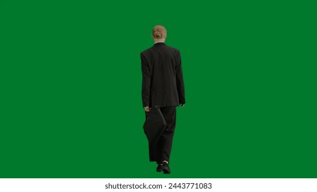 Portrait of female in suit on chroma key green screen. Blonde business woman in formal outfit walking. Back view. - Powered by Shutterstock