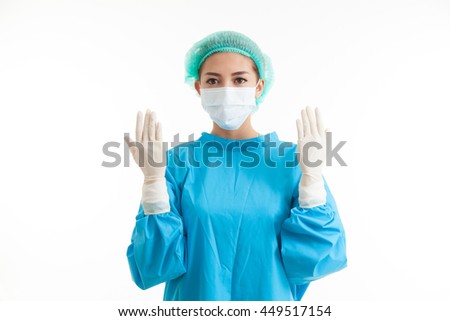 Portrait of a female surgeon preparing for surgery isolated on white.