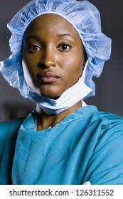 Portrait Of Female Surgeon In Scrubs