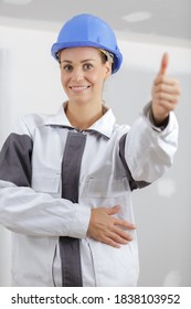 Portrait Of Female Tradesperson Making Thumbs Up Gesture