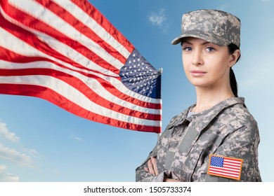 Portrait Of Female US Army Soldier On Flag Background