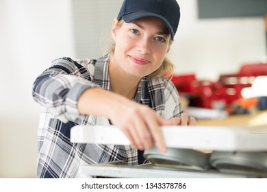 Portrait Of Female Worker In Kitchen