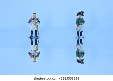 The portrait of the figures and their reflection