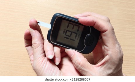 Portrait Fingertip Checking, Showing High Blood Sugar Pressure Monitor, Patient Diabetes Take Proactive Control, Concept Health Care.