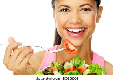 Portrait Of A Fit Healthy Hispanic Woman Eating A Fresh Salad Isolated On White