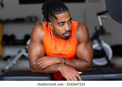 portrait of a fit man in his garage gym. - Powered by Shutterstock