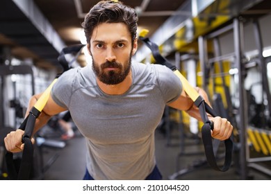 Portrait Of Fit Man Working Out In Gym. Sport People Healthy Lifestyle Exercise Concept