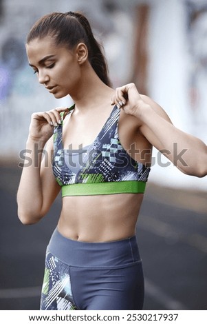 Similar – Slim figure shapely woman in sportswear