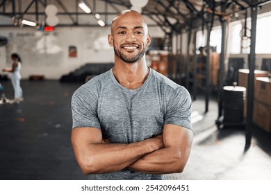 Portrait, fitness and happy man with arms crossed for workout, body health and wellness in gym. Face, smile and confident bodybuilder, personal trainer and strong athlete with muscle in sports club - Powered by Shutterstock