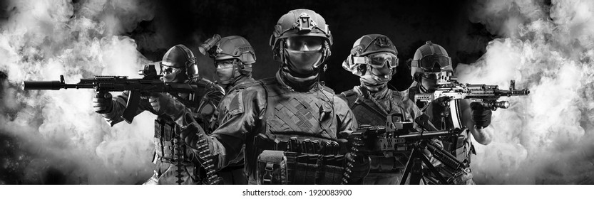 Portrait Of Five Military Men. A Group Of Soldiers On A Background Of Smoke. The Concept Of Military Operations, Special Operations, Paintball. Mixed Media