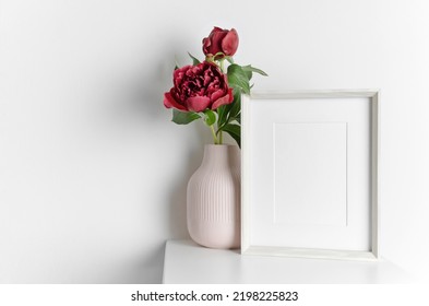Portrait Frame Mockup With Fresh Peony Flowers In Vase, Blank Mockup For Artwork Presentation