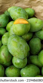 Portrait Fresh And Ripe Honey Mangoes In A Fruit Basket Ready To Be Sold In The Market.