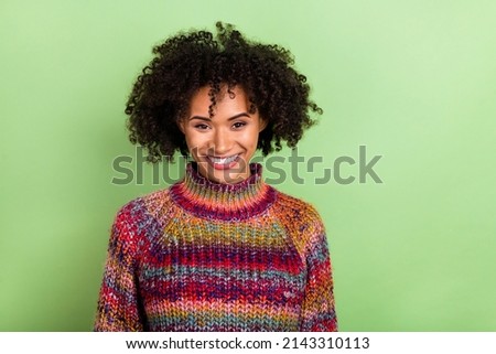 Portrait of friendly candid person beaming smile look camera isolated on green color background