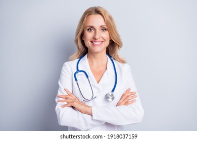 Portrait of friendly person folded hands toothy smile have good mood isolated on grey color background - Powered by Shutterstock