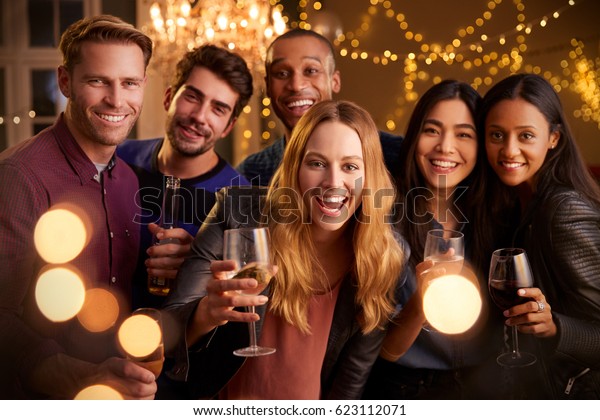 Portrait Friends Drinks Enjoying House Party Stock Photo Edit Now