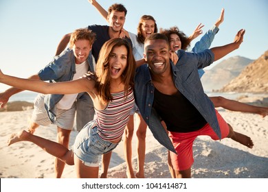 Portrait Of Friends Having Fun Together On Beach Vacation