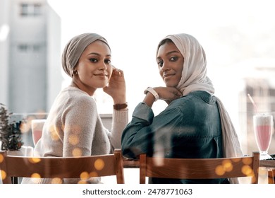 Portrait, friends and Muslim women at cafe together with milkshake for relax, reunion or bonding. Face, girls and Islamic people at restaurant for connection in diner with dessert, drinks and bokeh - Powered by Shutterstock