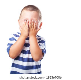 Portrait Of Fun Kid Covering His Face Over Abstract Background