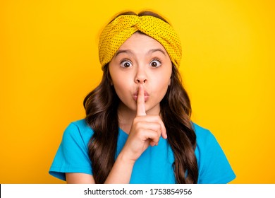 Portrait Of Funky Cute Child Girl Hear Incredible Private News Information Show Hush Symbol Lips Finger Ask Dont Tell Secret Wear Stylish Trendy Clothes Isolated Over Shine Color Background