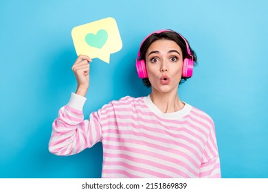 Portrait of funky funny impressed girl how like heart button enjoying favorite music isolated on blue color background - Shutterstock ID 2151869839