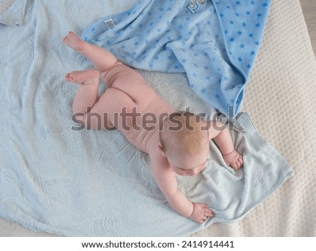 Similar – Baby girl with pompom hat sleeping