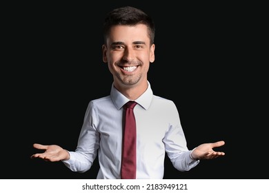 Portrait of funny businessman with big head on dark background
