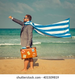 Portrait Of Funny Businessman On The Beach. Man Having Fun By The Sea. Summer Vacation And Travel Concept