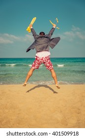 Portrait Of Funny Businessman On The Beach. Man Having Fun By The Sea. Summer Vacation And Travel Concept