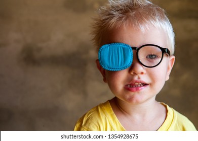 Portrait Of Funny Child In New Glasses With Patch For Correcting Squint 
Ortopad Boys Eye Patches Nozzle For Glasses For Treatment Of Strabismus (lazy Eye)