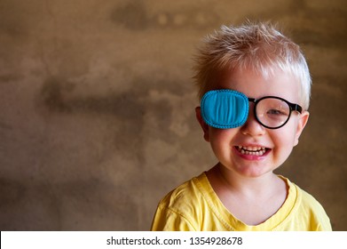 Portrait Of Funny Child In New Glasses With Patch For Correcting Squint 
Ortopad Boys Eye Patches Nozzle For Glasses For Treatment Of Strabismus (lazy Eye)