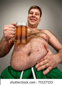 Portrait Of Funny Fat Man With Glass Of Beer