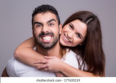 Portrait Of A Funny Love Couple Hugging Each Other