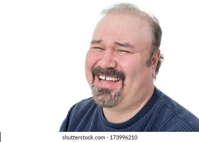 Portrait of a funny mature man laughing hard on a white background - Shutterstock ID 173996210