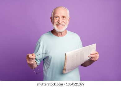 Portrait Of Funny Positive Old Man Reading Magazine Hold Glasses Isolated Over Purple Color Background