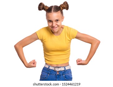 Portrait Of Funny Teen Girl Raised Her Hands And Shows Biceps, Isolated On White Background. Serious Cute Teenage Young Boy Shows Biceps. Strong Child Flexing Biceps.