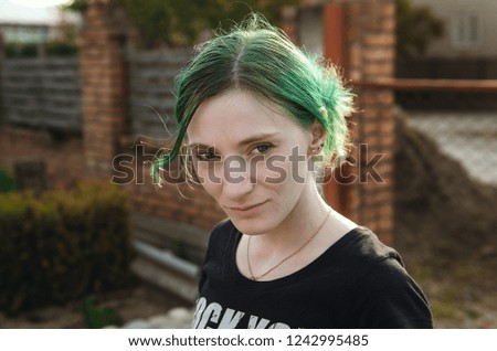 Similar – Image, Stock Photo Portrait of a laughing young woman with turquoise hair